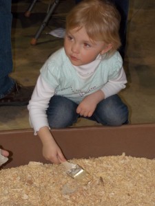 little girl in sandbox